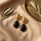 Aretes Ónix gota facetada & base ovalada dorada