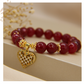 Pulsera Jade Rojo 10mm & dije de corazón con corazones mini en zirconitas