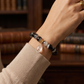 Pulsera de Ágata Marmoleada Negra y Blanca 12 mm con Dije de Cuarzo Blanco