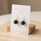 Aretes de Ónix Facetado en Esfera con Gancho Dorado