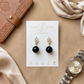 Aretes de Ónix Negro Facetado con Base de Espiga con Zirconias