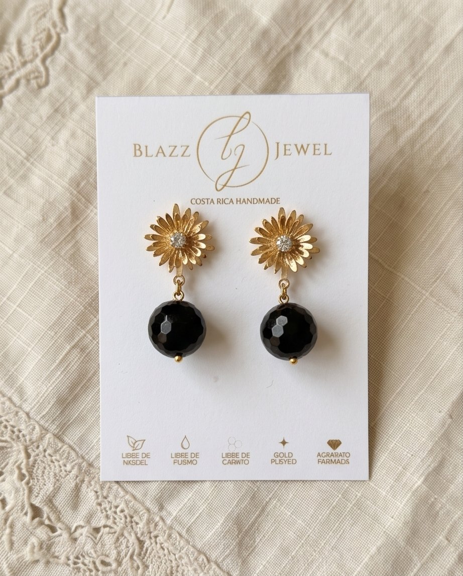 Aretes de Ónix Negro Facetado con Base Margarita con Zirconia