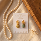 Aretes de Gota de Amazonita Facetada con Base de Flor Labrada 3D en Baño de Oro