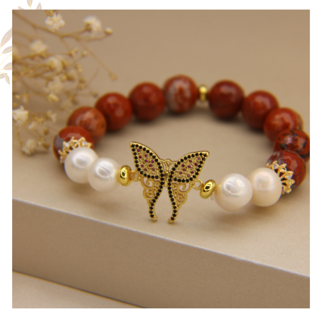 Pulsera Jaspe Rojo 12mm y perla blanca & enlace de mariposa con zirconias y baño en oro