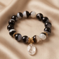 Pulsera de Ágata Marmoleada Negra y Blanca 12 mm con Dije de Cuarzo Blanco