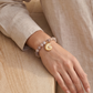 Pulsera Agata Drusy con dije de caracola dorada y zirconias