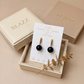 Aretes de Ónix Negro Facetado con Base de Palito Dorado en Baño de Oro