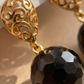 Aretes de Ónix Negro Facetado con Base de Gota Labrada