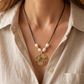 Collar de Cordón Negro con Perlas Naturales y Dijes de Mariposa y Libélula