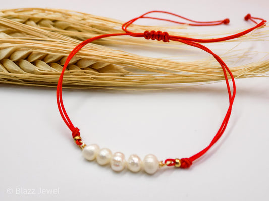 Pulsera roja con enlace de perla natural