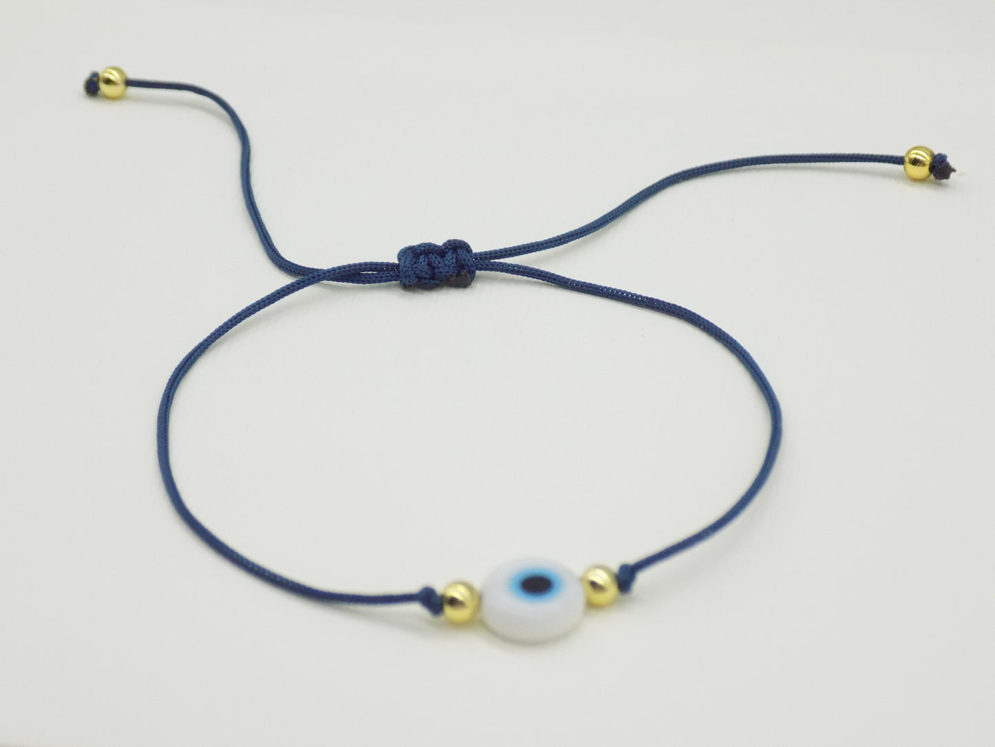 Pulsera ajustable de hilo con ojo turco