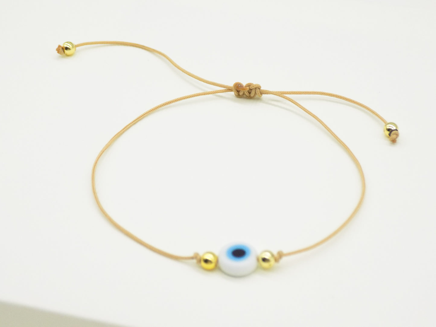 Pulsera ajustable de hilo con ojo turco